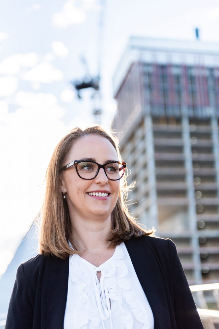 Gemma Nugent in front of a building